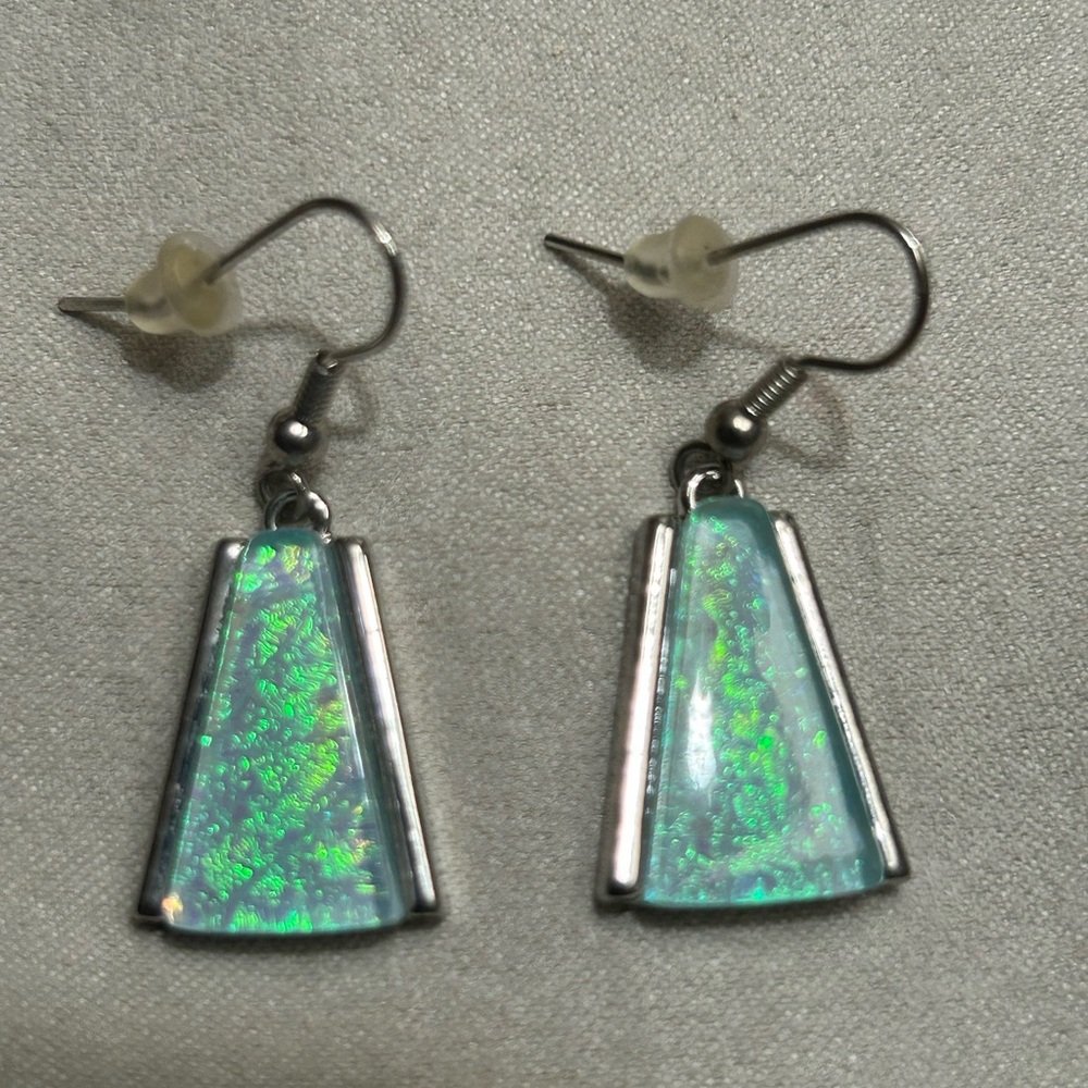 Very pretty opal like earrings with silver frame.